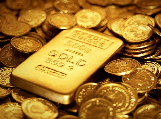 Золото удерживает резкое снижение после позитивных американских данных